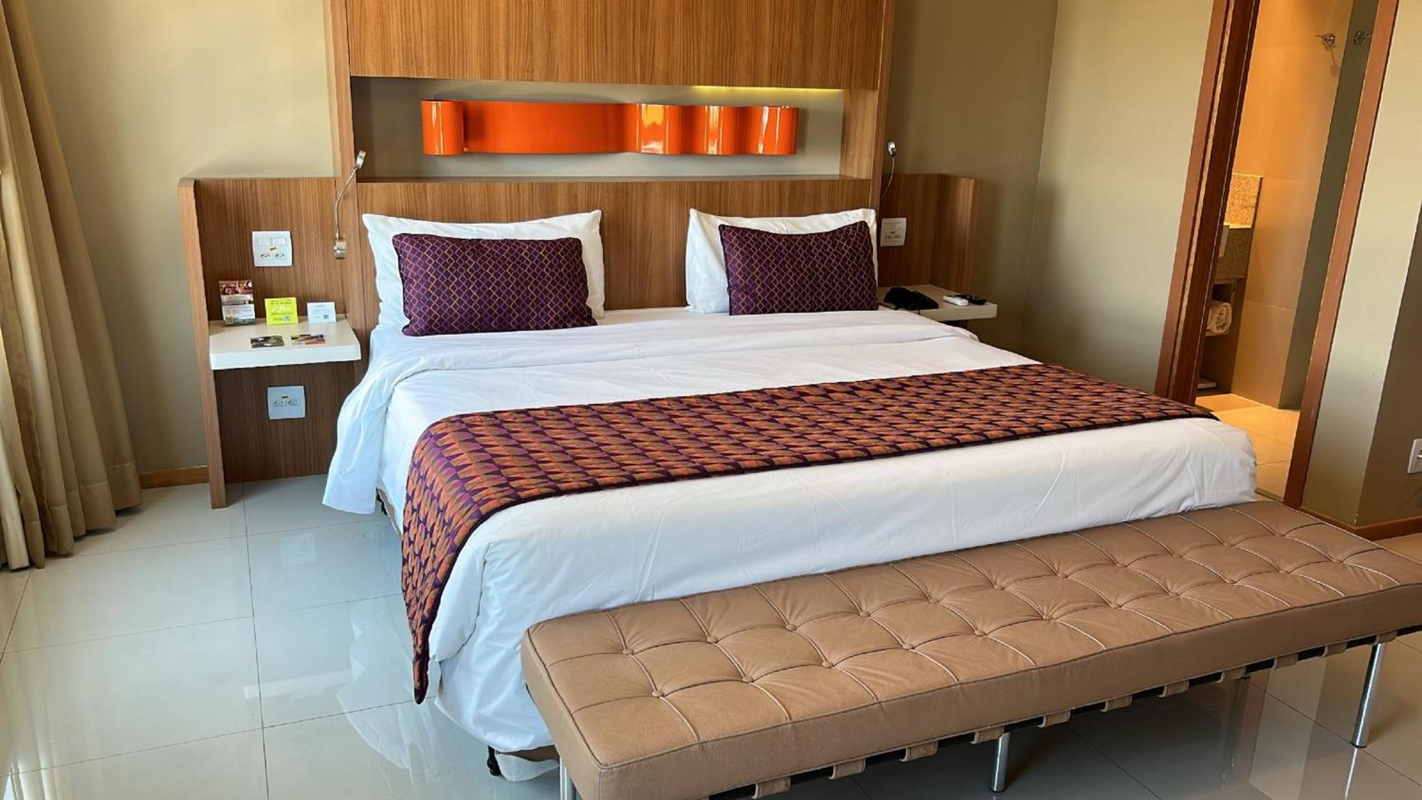 巴西利亚尊玉蓝树酒店 Candangolandia 外观 照片 A bed in a hotel room